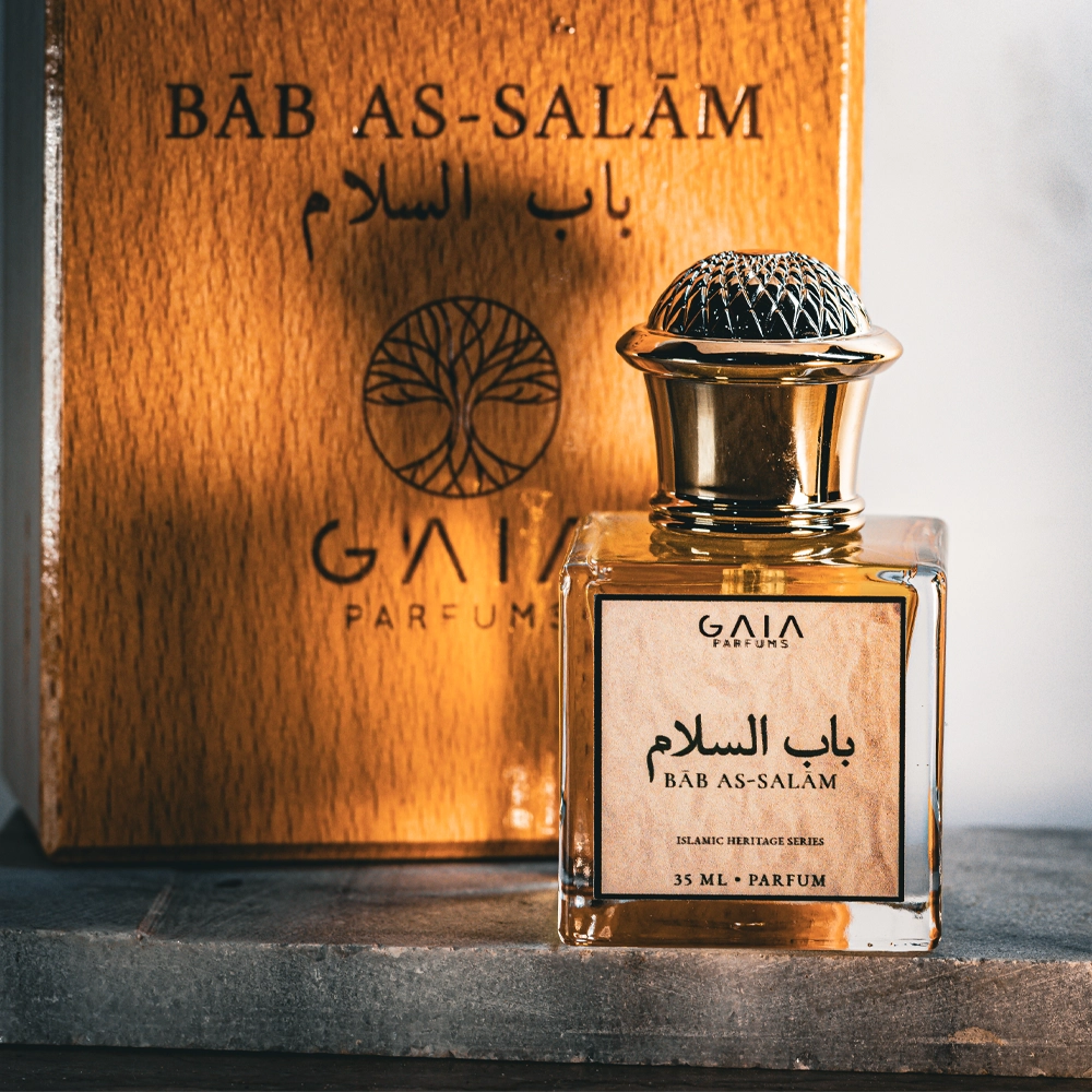 Bāb as-Salām by GAIA Parfums, an Islamic Heritage Series perfume in a square glass bottle with amber liquid, gold cap and wooden box